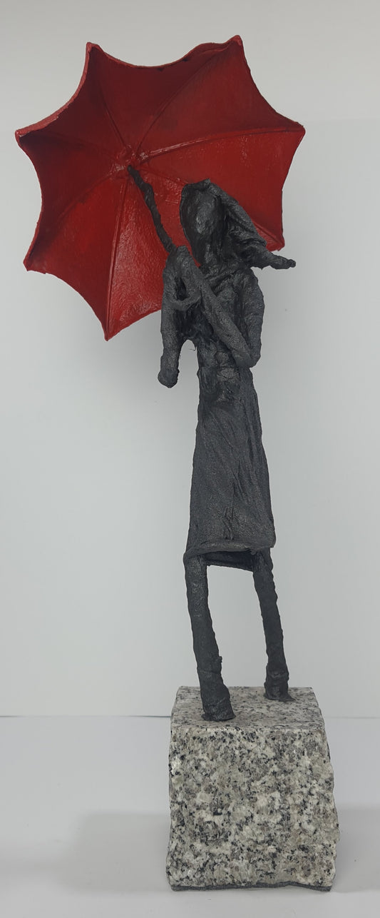 Mädchen mit einem Regenschirm