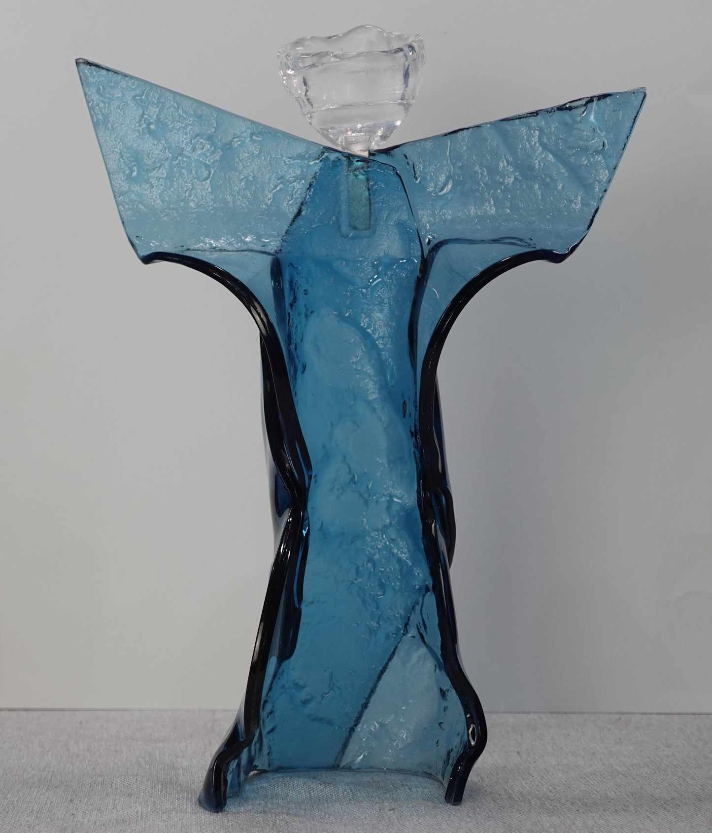 Blauer Engel Form aus Glas
